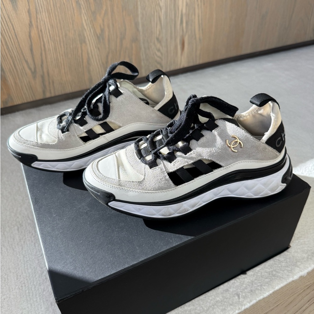 CHANEL Classic Sneakers in Ivory/White
Calfskin Suede + Gold Chanel Logo - Picture 6 of 9